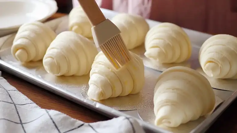 The Unexpected Egg Wash Alternative You Probably Have In Your Fridge