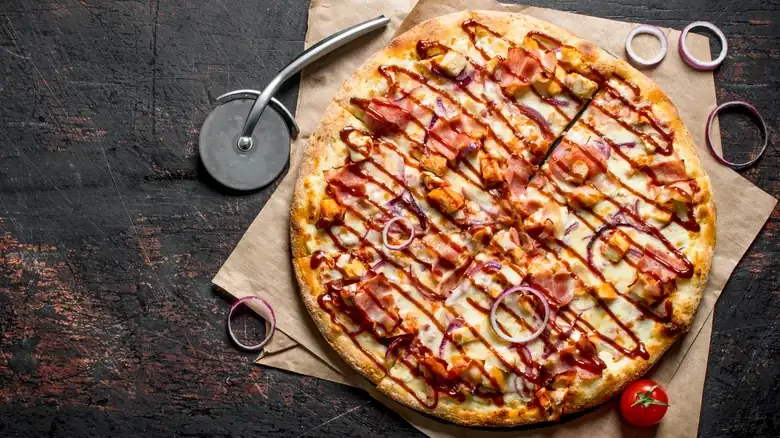 The Unexpected Origins Of BBQ Pizza