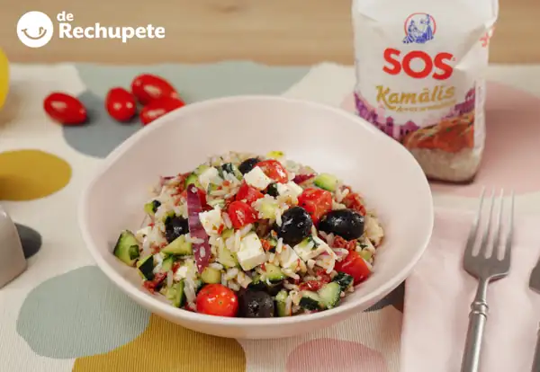 Mediterranean rice salad with sun-dried tomatoes, olives, and feta. A fresh recipe for summer