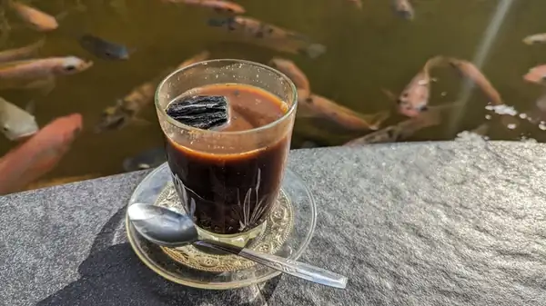 How Indonesia's Charcoal-Infused Coffee Takes Your Brew To The Next Level