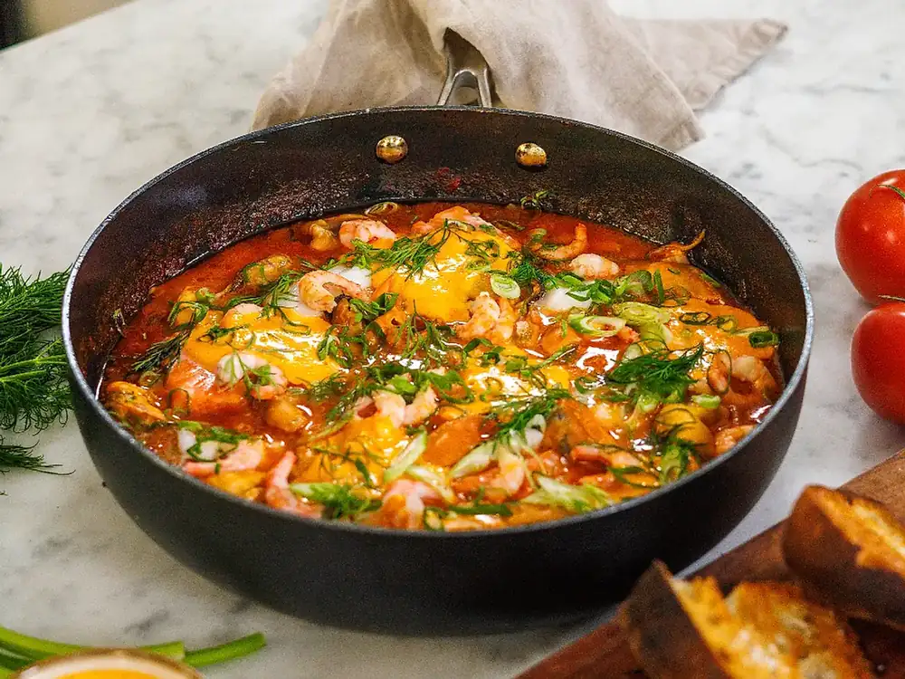 Fish stew and aioli flavored with grilled peppers
