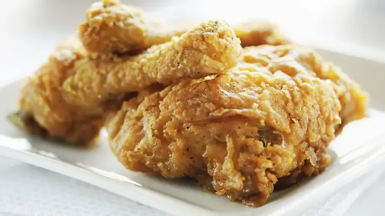 For Ridiculously Crispy Fried Chicken, A Splash Of Liquid In Your Flour Is Key