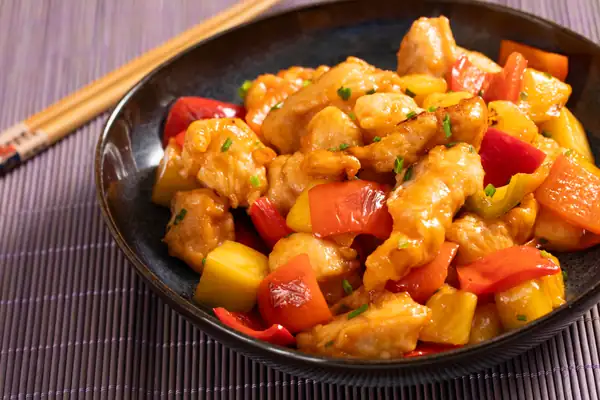Sweet and sour chicken with peppers and pineapple