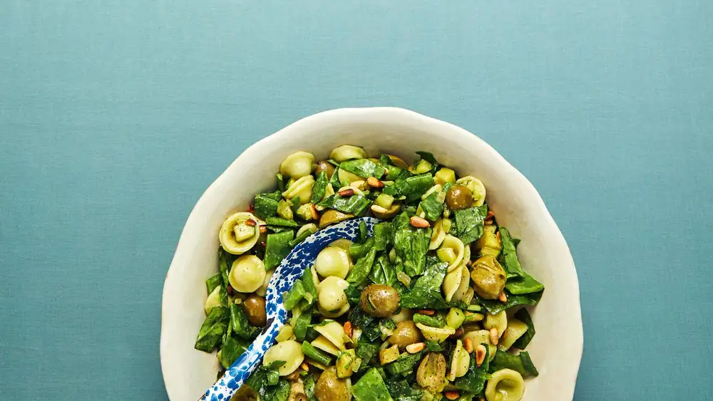 A truly tasty pasta salad with bright green pesto dressing by Yvette van Boven