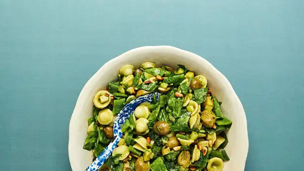 A truly tasty pasta salad with bright green pesto dressing by Yvette van Boven