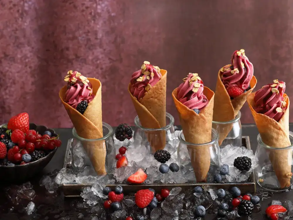 Cinnamon waffle cones with frozen berry yogurt