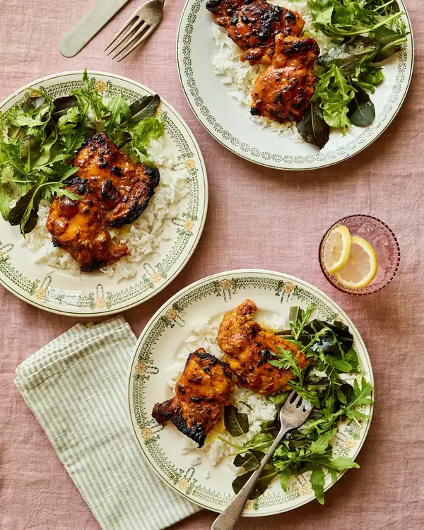 Sabrina Ghayour’s recipes for mango and chilli chicken, sticky spring onions and latke