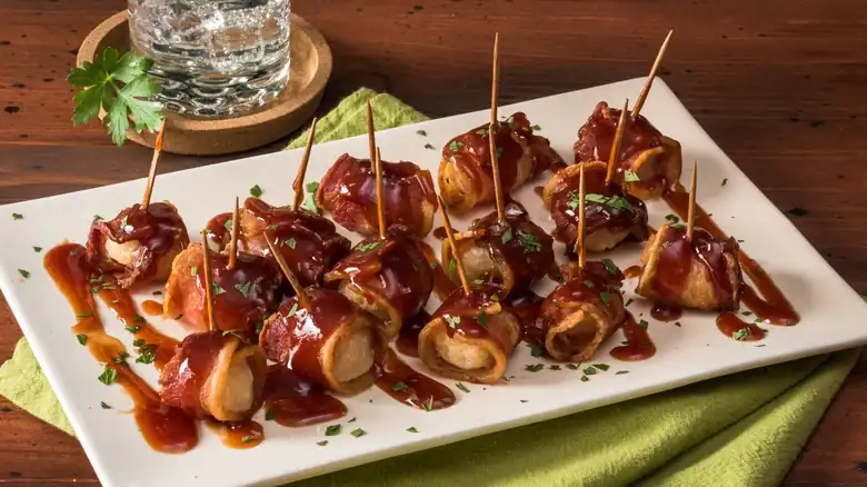 Bacon-Wrapped Water Chestnuts Are The Easy Appetizer Your Christmas Party Needs