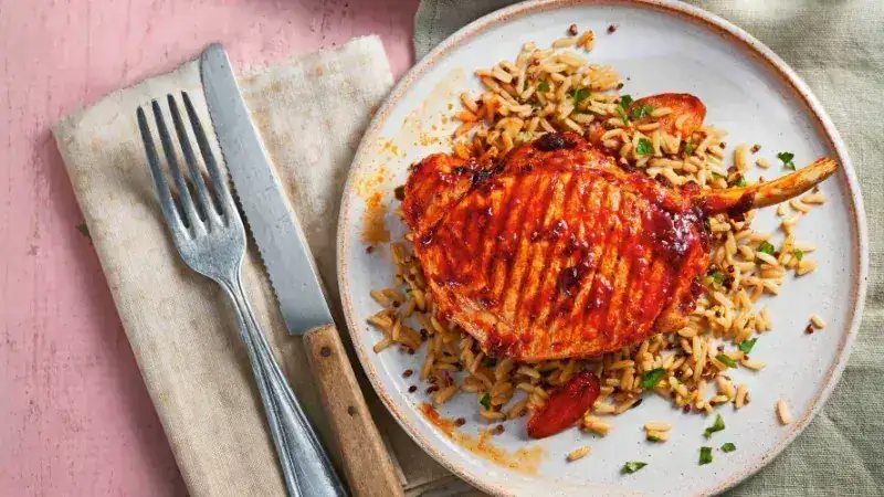 Spicy cutlets with roasted carrots and rice salad