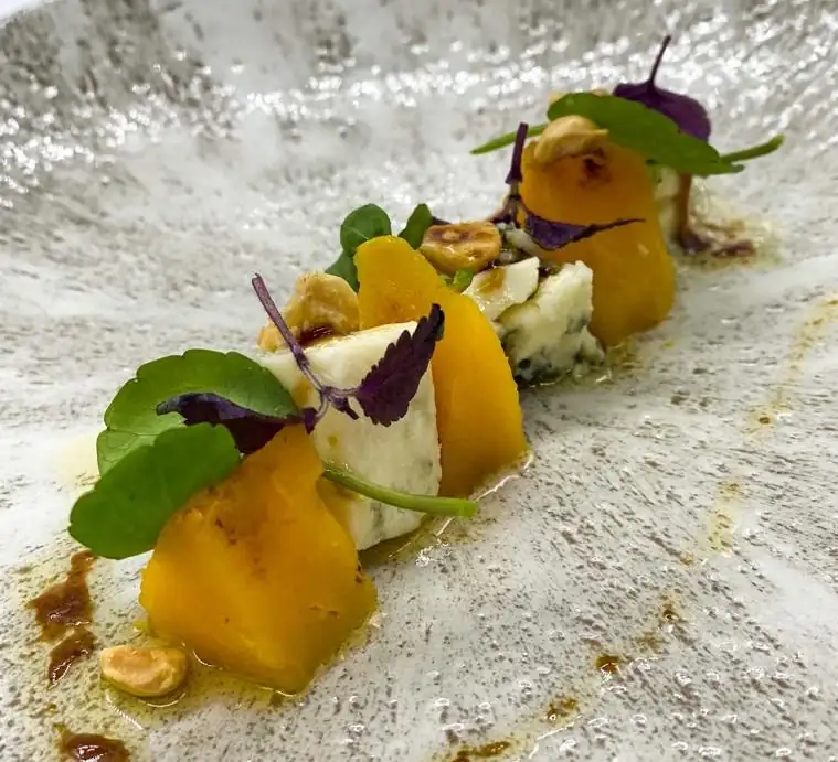 Autumn salad with pumpkin, blue cheese, hazelnuts, watercress and ratafia vinaigrette