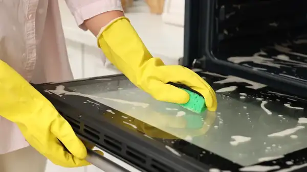 Mistakes You're Probably Making When Cleaning Your Oven