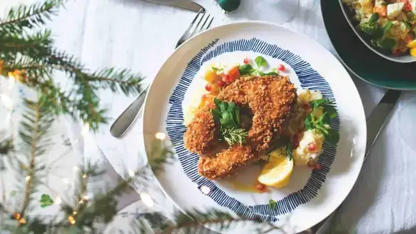 Carp horseshoes with potato salad