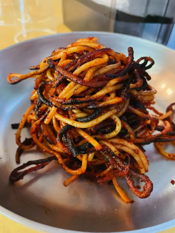 The History of Spaghetti all’Assassina