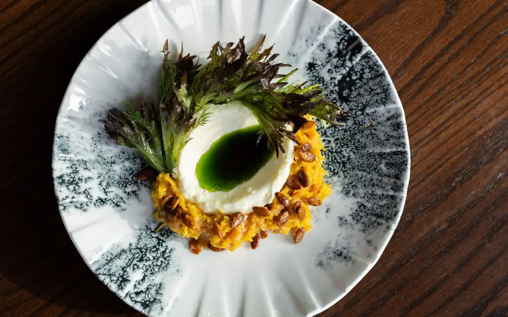 River Café serves cuisine with Canadian and Alberta ingredients by the river.