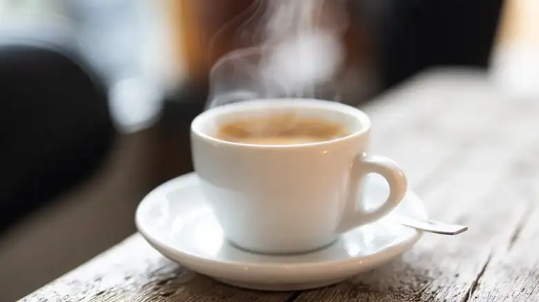 Espresso experts disagree on whether it's advisable to remove the crema.