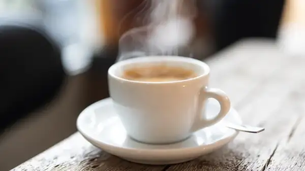 Espresso experts disagree on whether it's advisable to remove the crema.