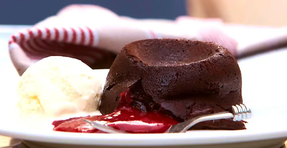 Hot Chocolate Fudge Cake w/ Berry Coulis