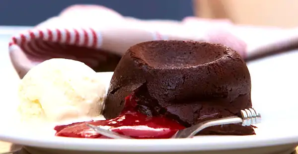 Hot Chocolate Fudge Cake w/ Berry Coulis
