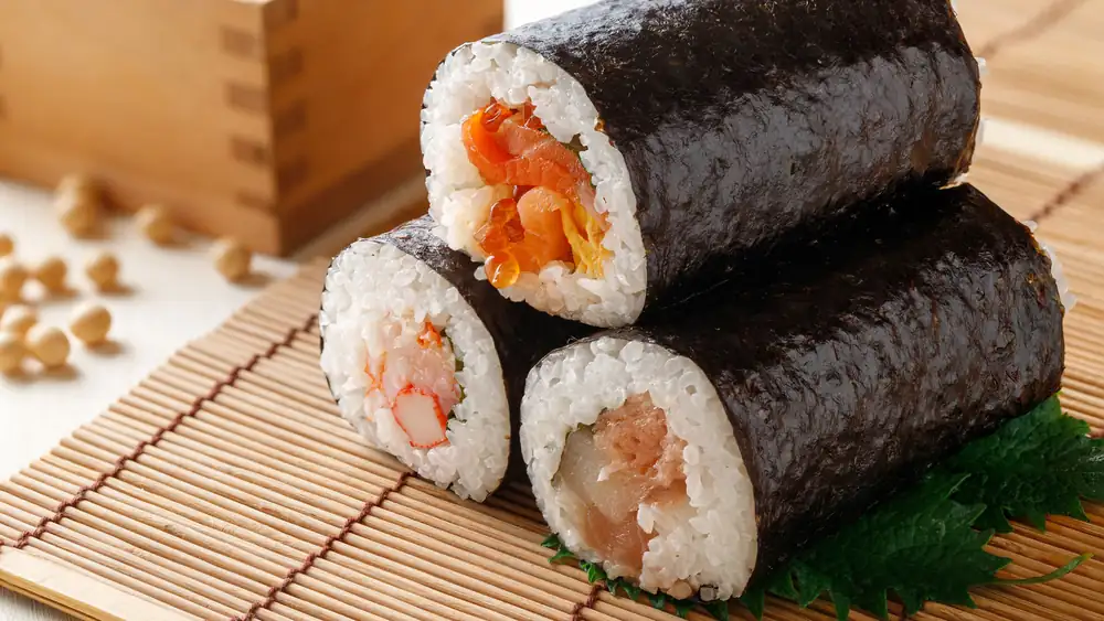 Don't Own A Sushi Mat? Use Parchment Paper Instead