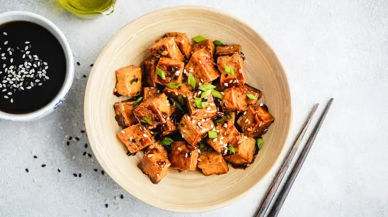 The Step You Need To Take Before Adding Tofu To Your Marinade