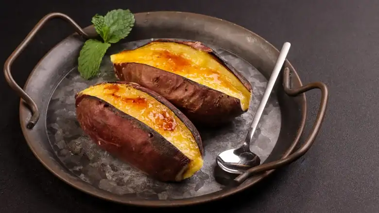The Controversial Tip For Ultra-Creamy, Caramelized Sweet Potatoes