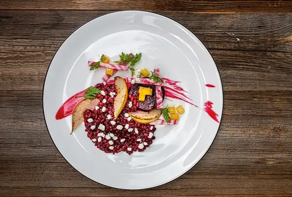 Beetroot and pearl barley risotto with pear and cream cheese