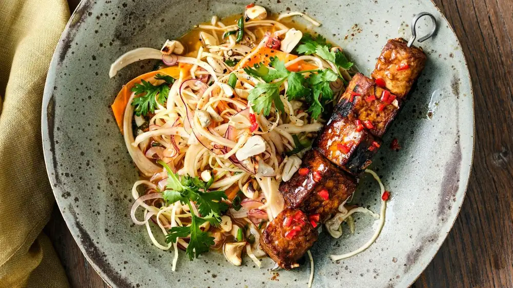 Tempeh skewers with sweet and sour coleslaw
