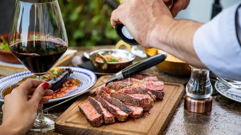 The Red Wine And Meat Pairing Advice You Should Take With A Grain Of Salt