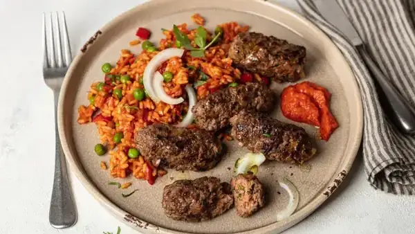 Cevapcici with vegetable rice