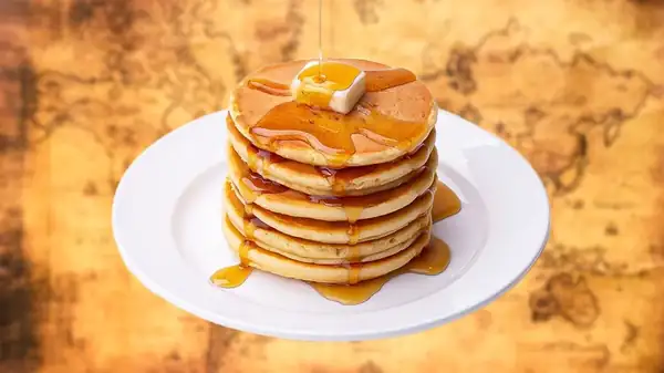 We've Been Eating Pancakes And Syrup For Longer Than You May Have Thought
