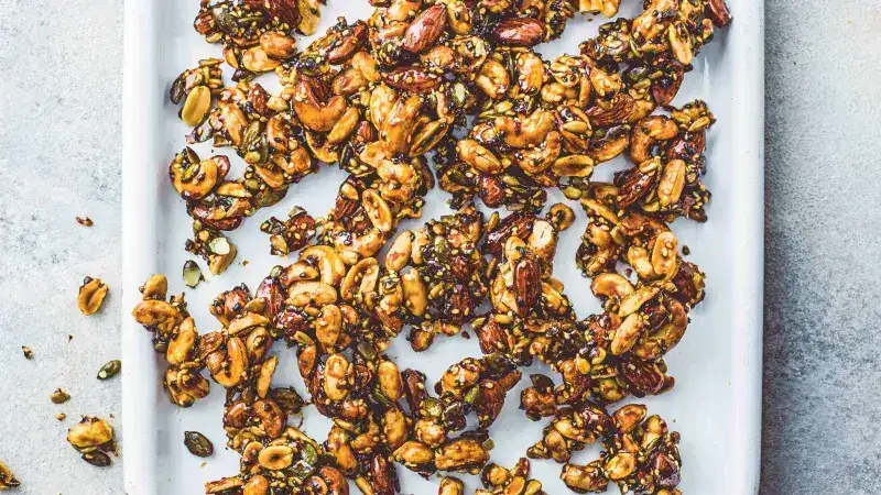 Nut and seed mixture in caramel with bowl