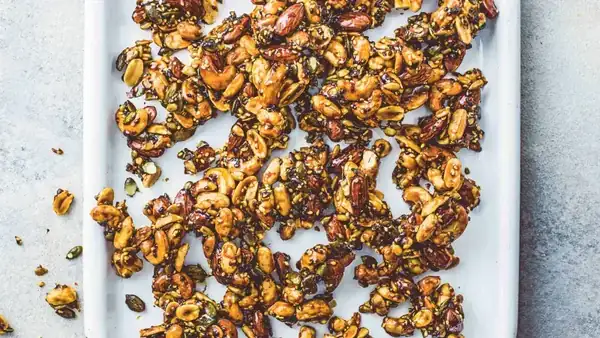 Nut and seed mixture in caramel with bowl