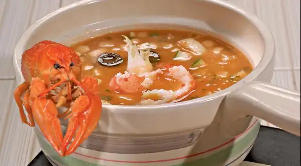 Tomato soup with crayfish tails