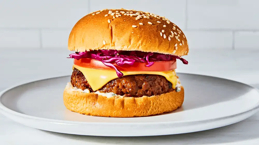 The Ultimate Plant-Based Burger with Ramp Aioli, Purple Cabbage & Tomatoes