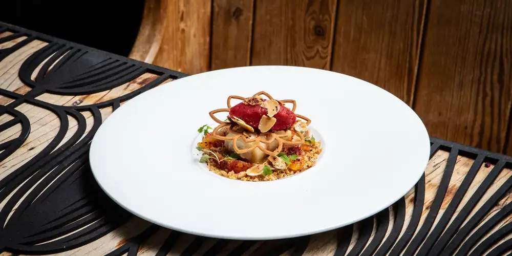Labneh halawet el jibn, blood orange, almond and olive oil