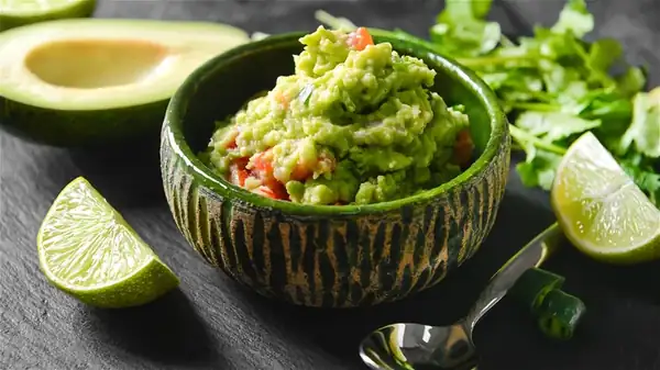 The Science Behind How Sour Cream Can Keep Guacamole Nice And Green