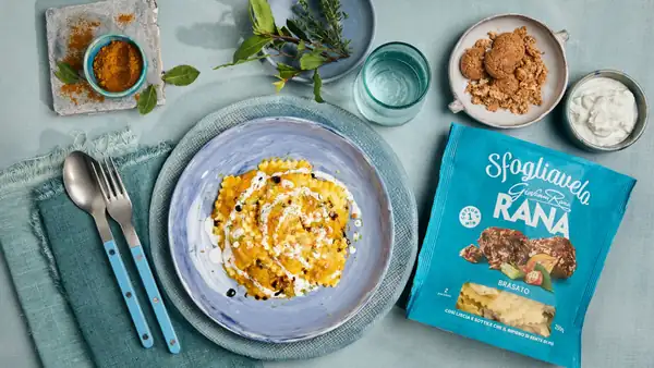Curry-flavored braised beef with pumpkin cream and goat cheese sauce by Federica Carucci