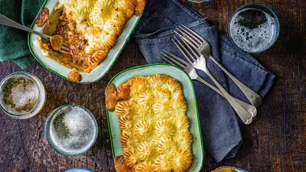 Warm pie with minced meat and cheese mash
