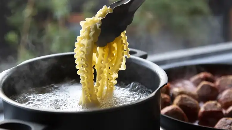 Add a stock cube to the pasta water for noodles full of umami flavor.