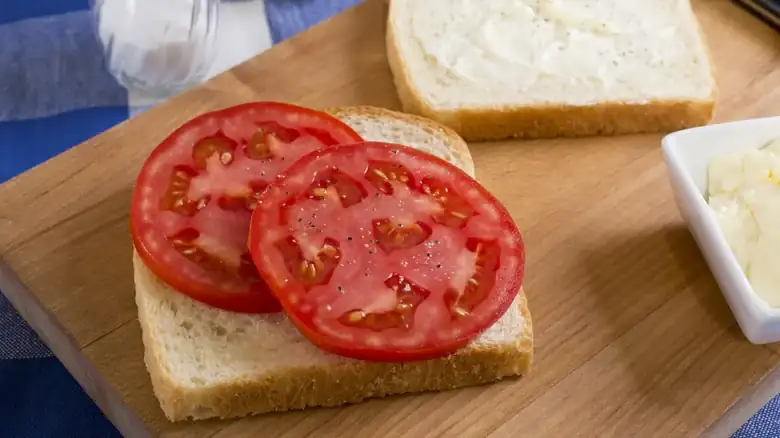 Here's Why It's Important To Always Salt Tomatoes Before Adding Them To A Sandwich