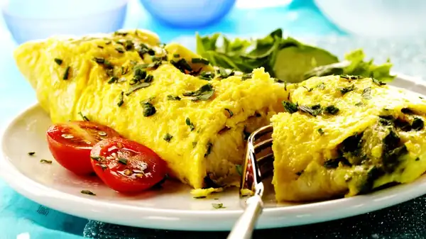 Elevate Your Omelets With An Unexpected Creamy Addition