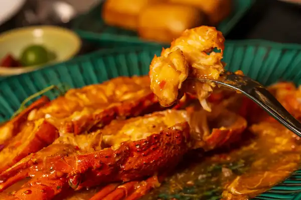 At The Straits, fresh lobster accompanies Singapore's famous chili sauce.