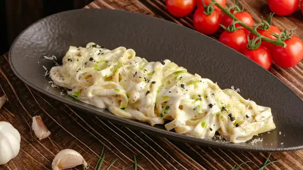 Add 10x More Flavor To Alfredo Sauce With This Italian Ingredient