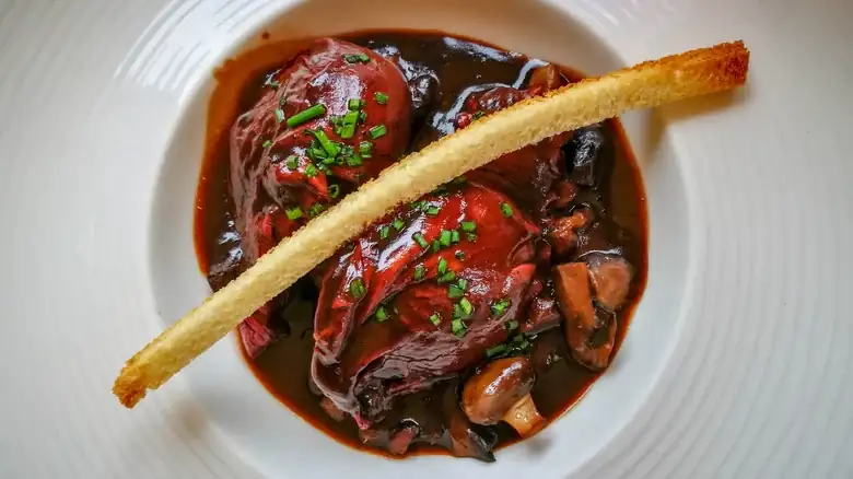 Eggs meurette, a French dish of poached eggs in red wine sauce