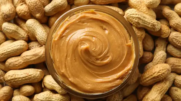 The Stunning Amount Of Peanut Butter The Average Human Consumes Each Year