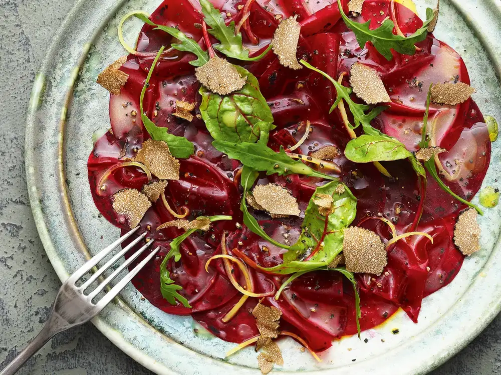 Beetroot carpaccio with arugula and olive-lemon marinade