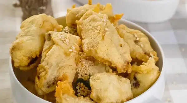 Tongue in batter with sauce