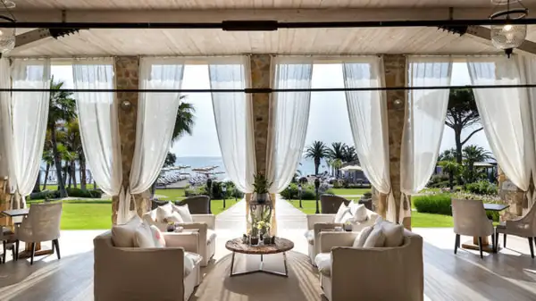 In Southern Sardinia, a hotel with two restaurants where lamp service is a seaside ritual