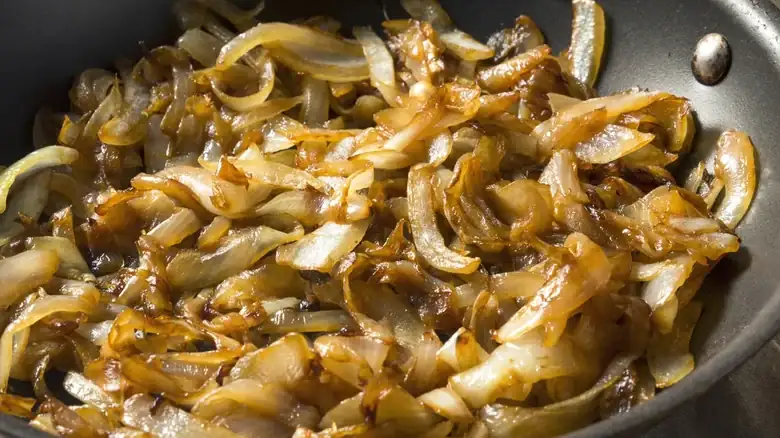 A Splash Of Whiskey Gives Caramelized Onions The Best Flavor