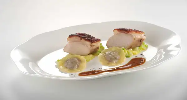 Suckling Pig with Pork Ravioli & Sautéed Pointed Cabbage